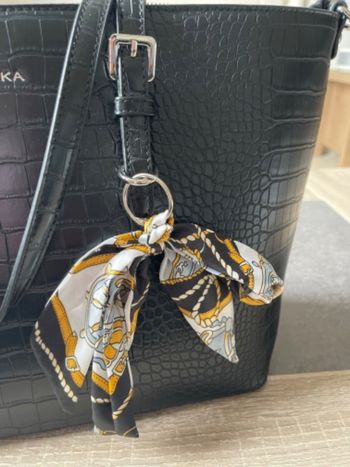 Flot de décoration de sac à main neuf