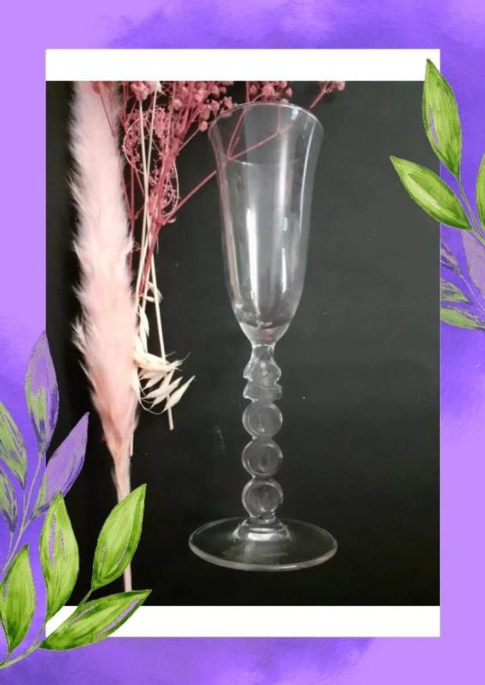 flute champagne inscription année 2000 sur le pied