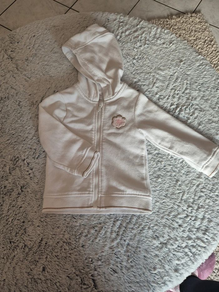 Gilet à capuche