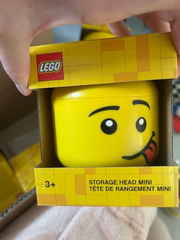 Mini tête de rangement. Lego.