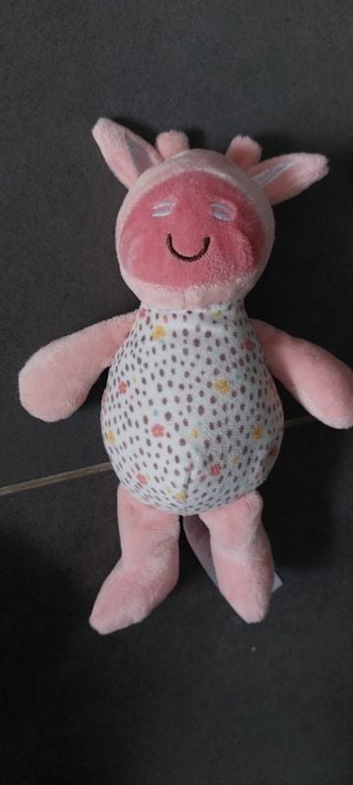 Doudou rose avec grelot