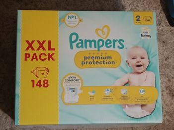 Couches xxl Pampers taille 2 neuf