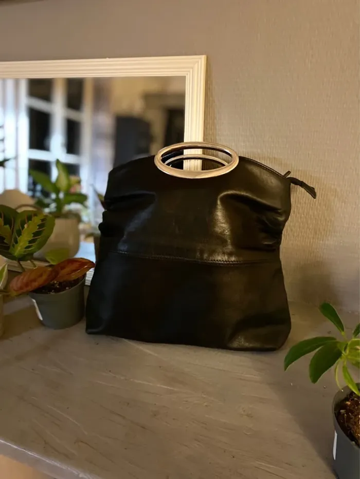Sac vintage cuir porté main Heyraud