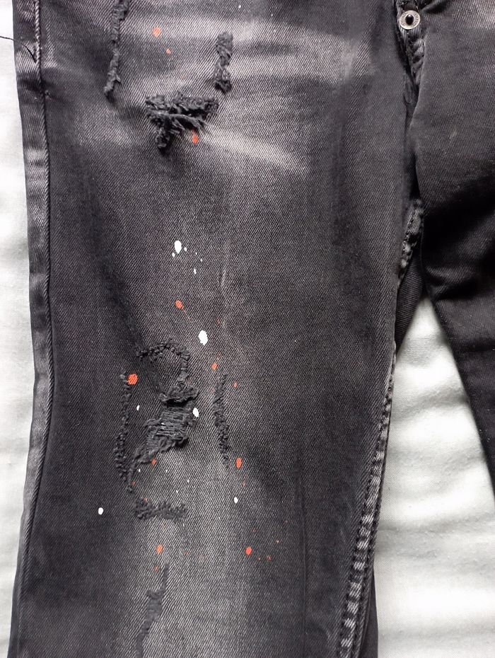 Jean effet "troué taché" - photo numéro 4