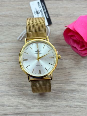 Montre femme dorée cadran rond blanc