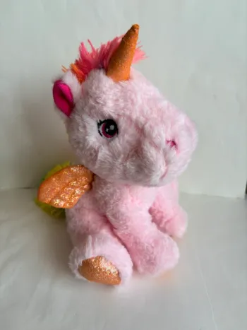 Peluche licorne assise