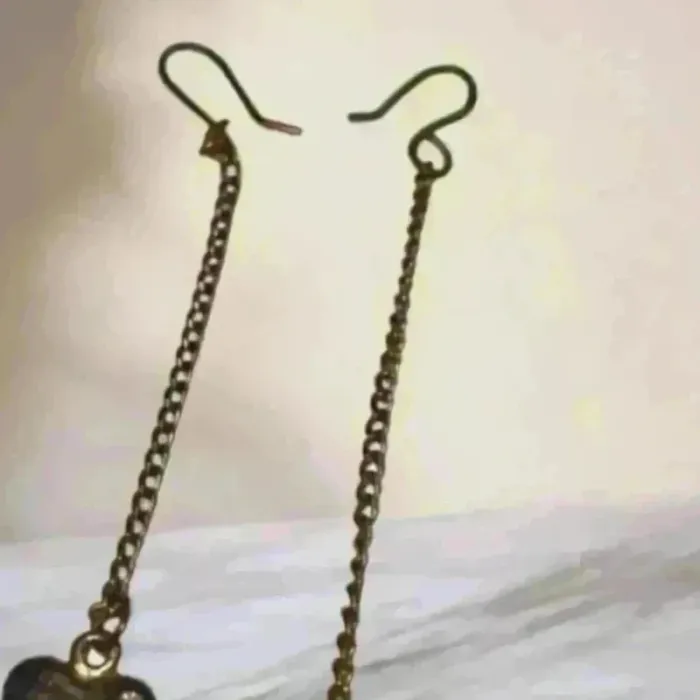 Boucles d’oreilles pendantes dorées - Cœur