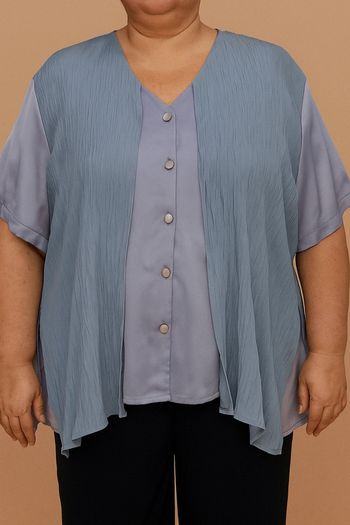 Jolie blouse parme taille 60