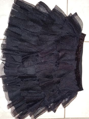Jupe noire brillante à volants 8 ans
