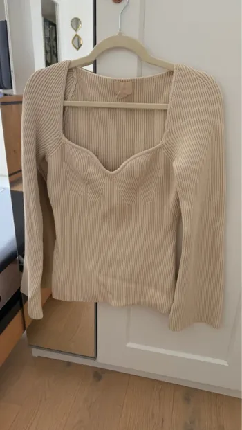 Pull encolure coeur