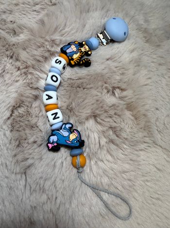 Attache tétine bourriquet